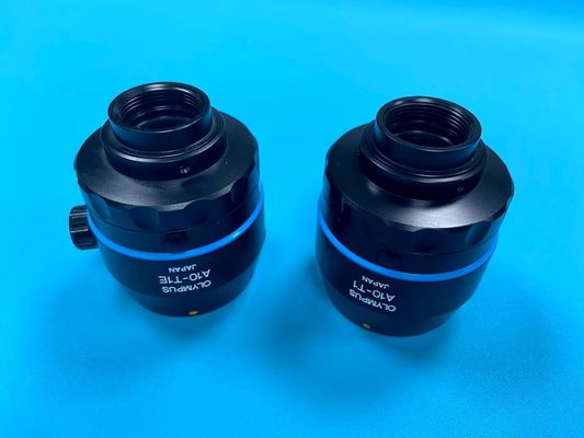 Фокусирующий объектив для Olympus A10-T1E соединяется с головой камеры